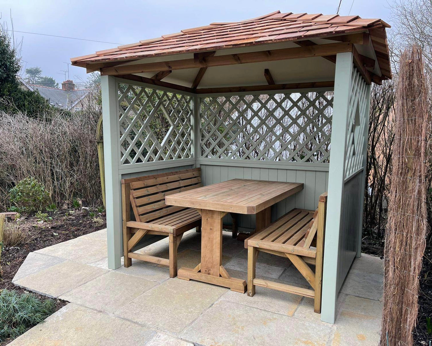 Painted wooden garden arbour