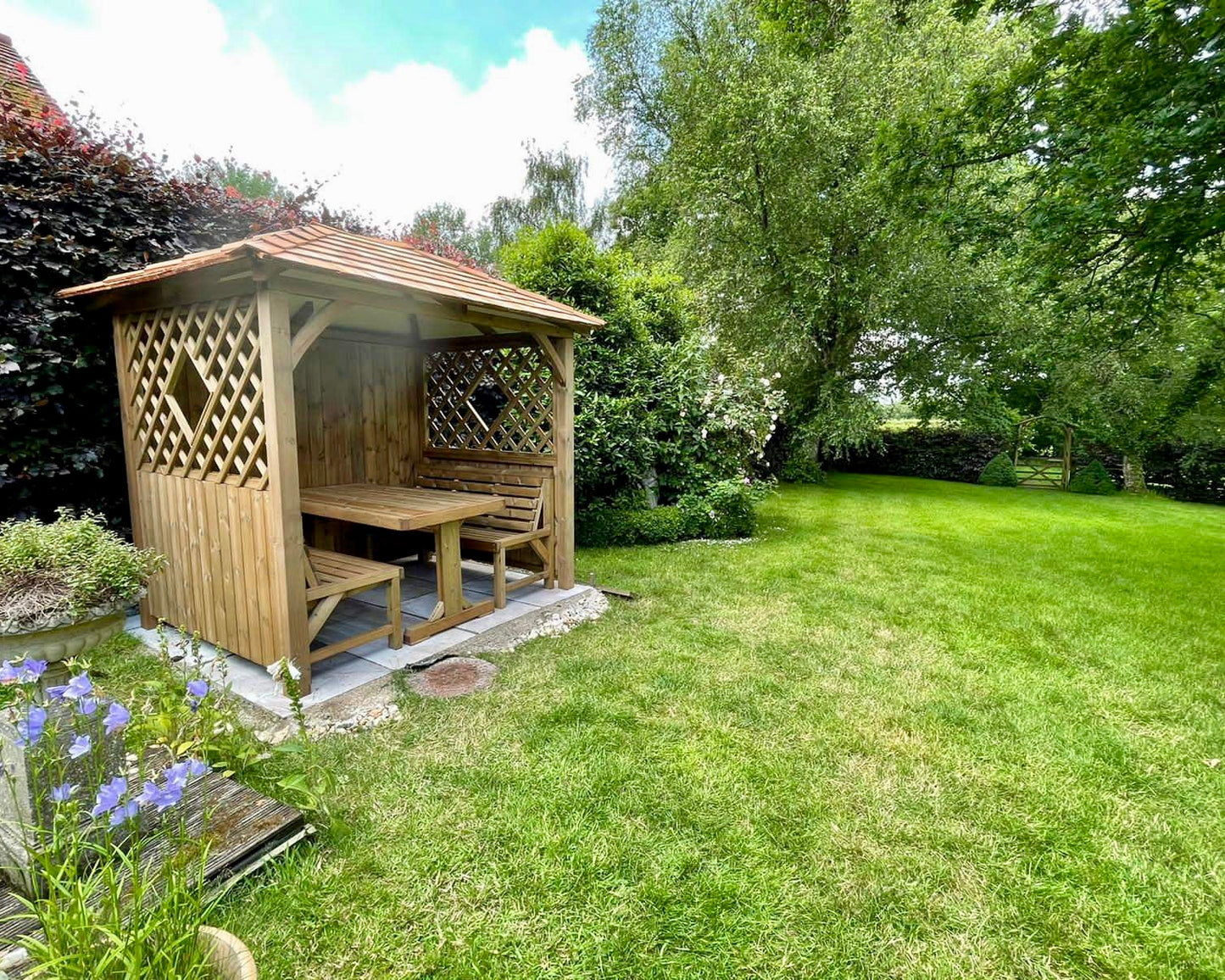 Arbour with cedar shingle roof 