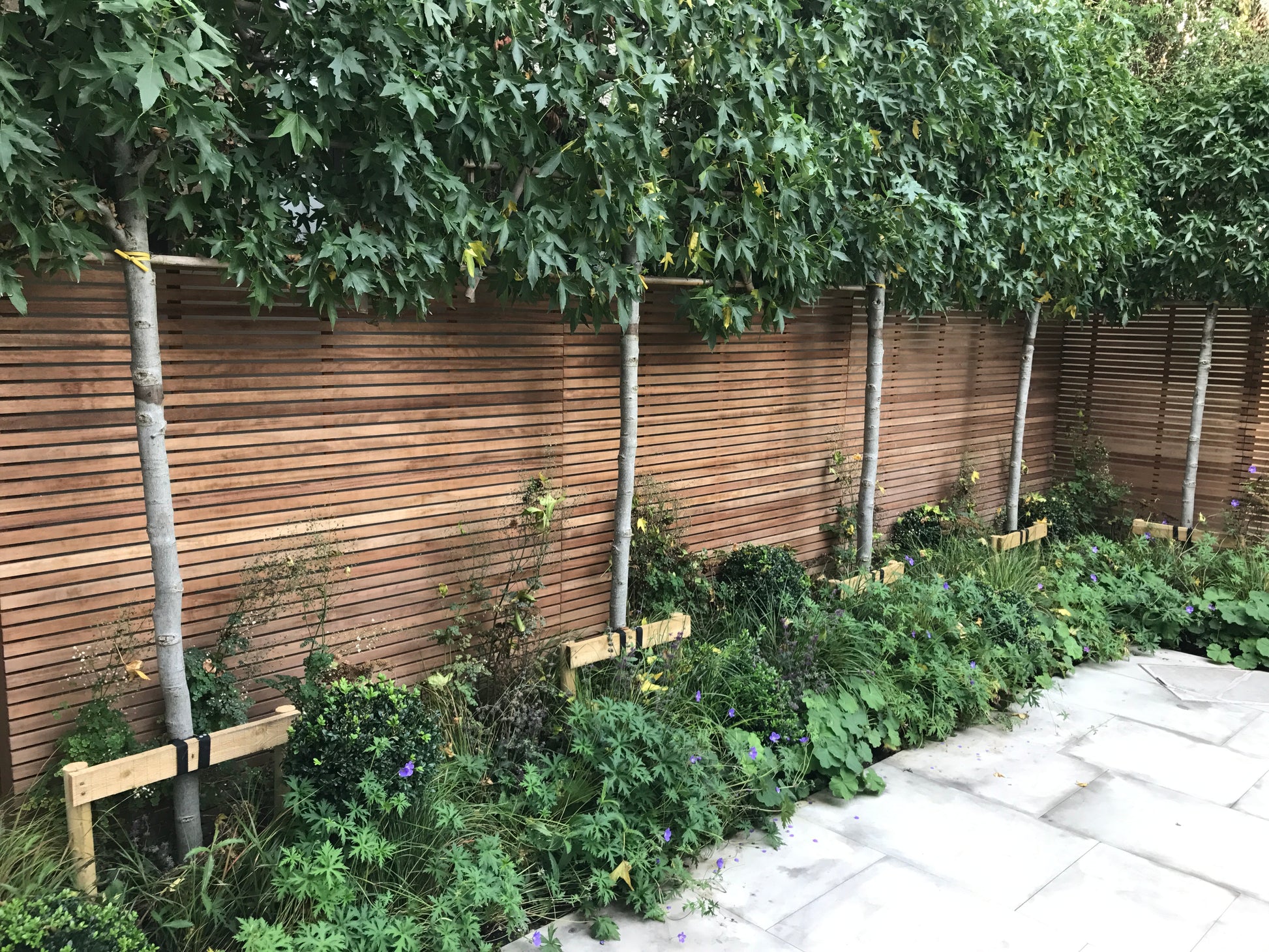 iroko slatted fence panels by duckpaddle